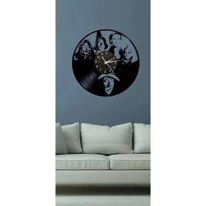 Wizard of Oz black metal clock aprox 12” in diameter